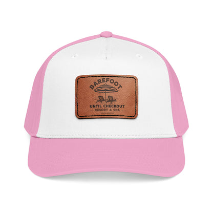 Pink and white cap with a brown leather patch featuring "Barefoot Until Checkout Resort & Spa"on a white background