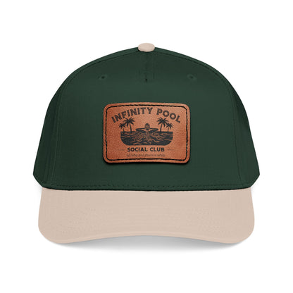 Green and beige cap with a brown leather patch featuring 'Infinity Pool Social Club'