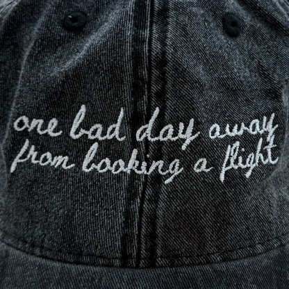 One Bad Day Away from Booking a Flight -  Travel Truths Hat