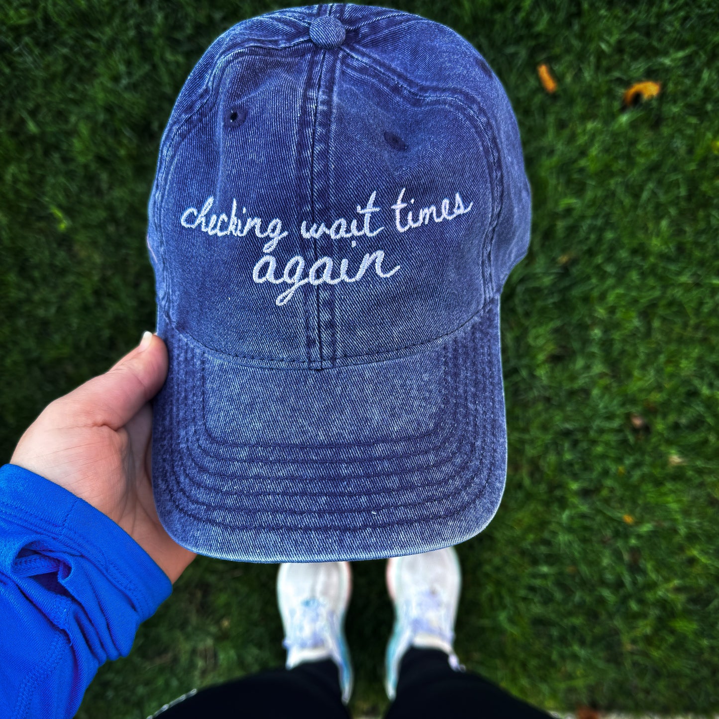 "Checking Wait Times Again" Funny Travel Hat for Theme Park Lovers - held