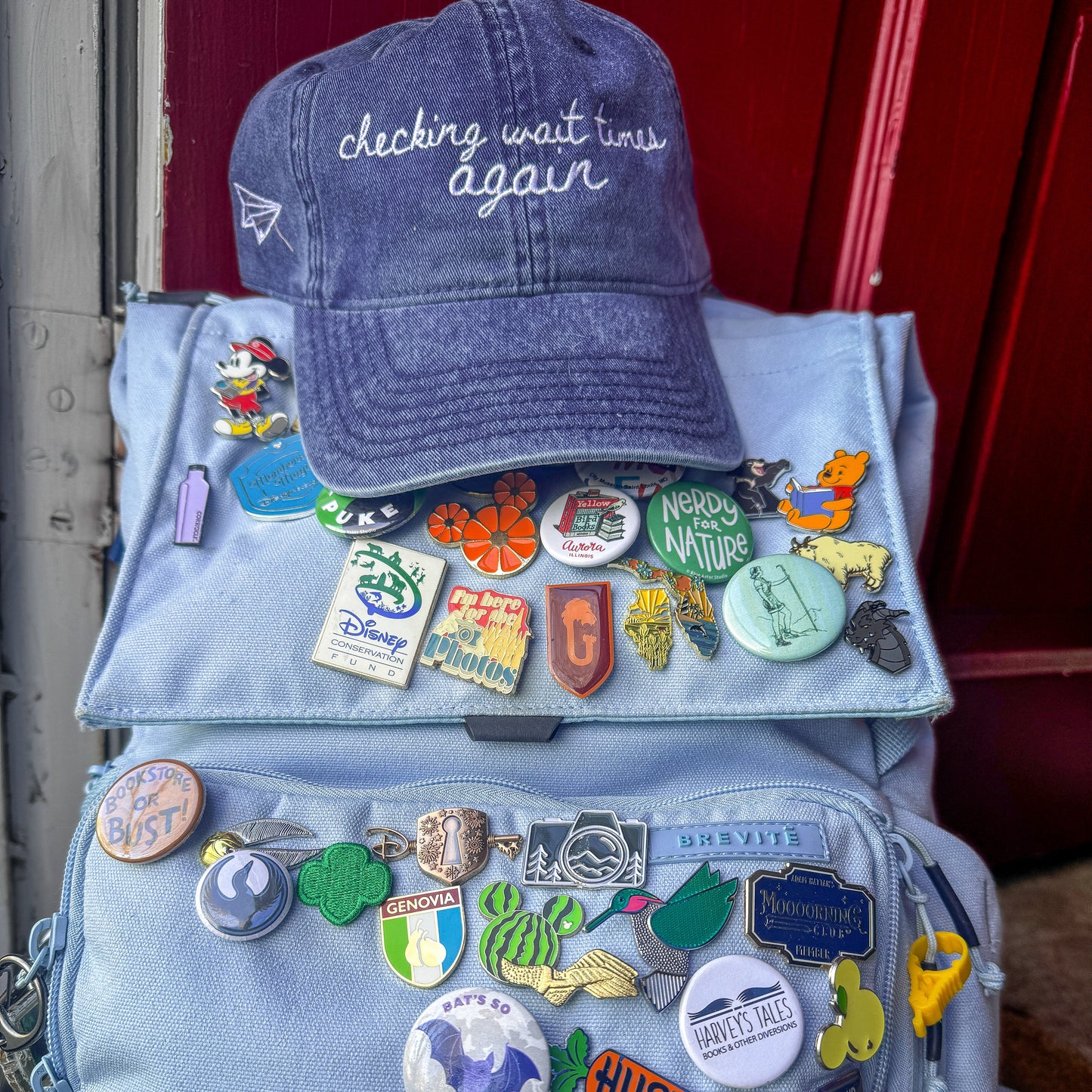 "Checking Wait Times Again" Funny Travel Hat for Theme Park Lovers - on backpack