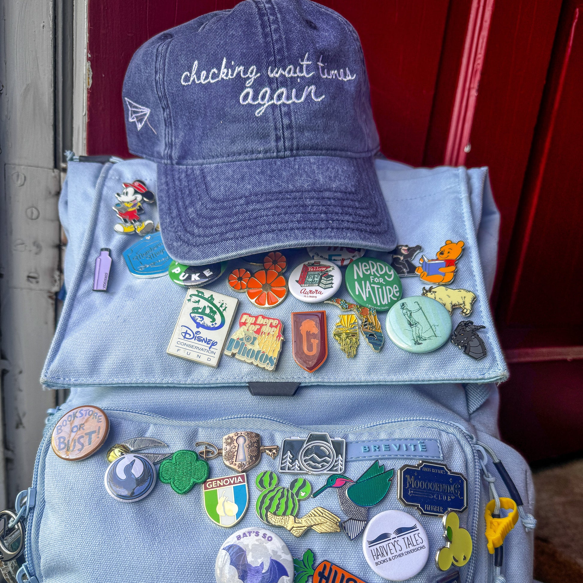 "Checking Wait Times Again" Funny Travel Hat for Theme Park Lovers - on backpack