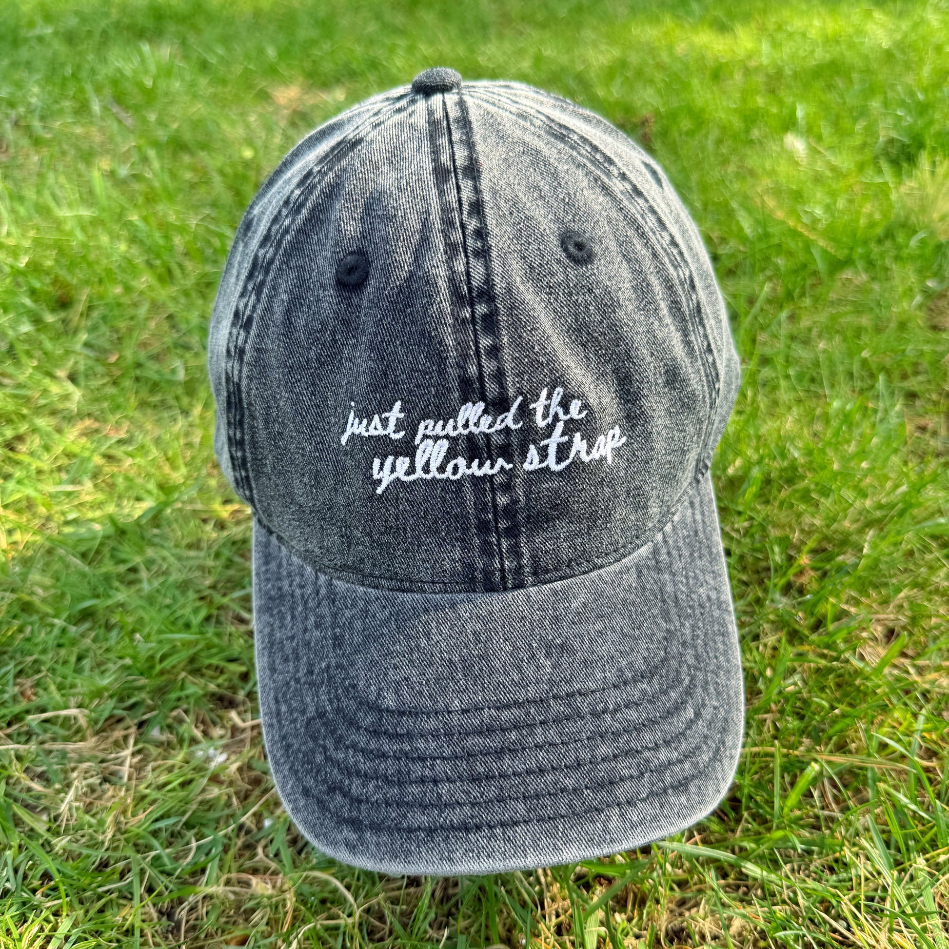 "Just pulled the yellow strap" Funny Travel Hat for Theme Park Lovers -  on grass